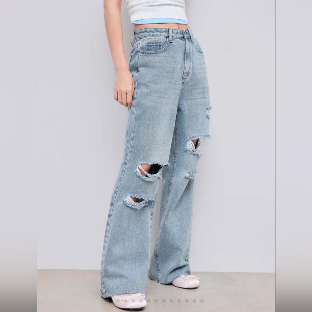 Mid Rise Ripped Straight Leg Jeans